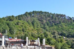 Pir-Sohawa-surrounded-by-thick-green-hills-1-1-scaled